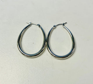 Pair of silver hoop earrings.