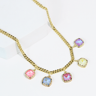 Gold necklace with colorful gemstones made by Treasure Jewels.