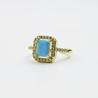 Treasure jewels gold ring with a turquoise gemstone