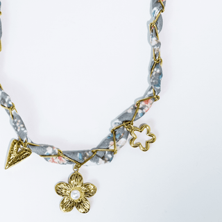 Necklace with floral charms. 