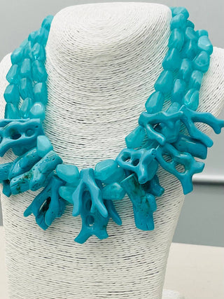 Turquoise marble colored coral statement necklace.