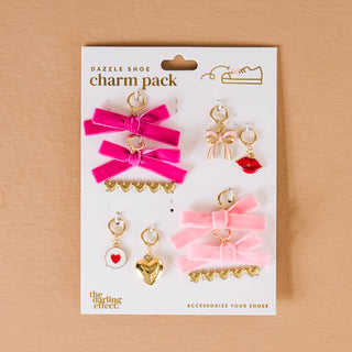 Charm pack with pink and gold bow-shaped charms 
