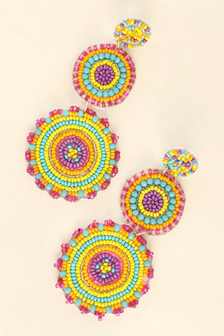 Colorful beaded disc earrings.