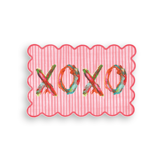 Pink doormat with 'XOXO' design.
